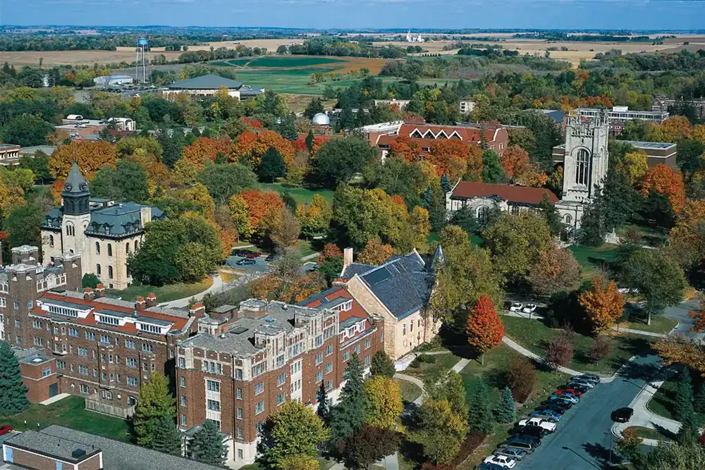 Aerial view of Carleton College buildings among autumn trees in Northfield, Minnesota